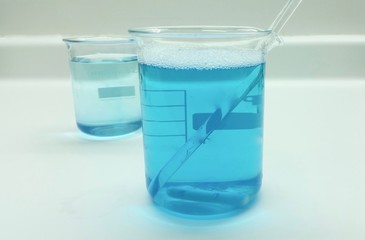 Beaker with blue bath gel