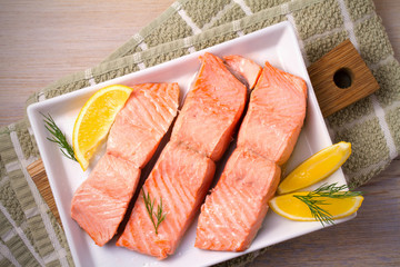 Steamed salmon fish fillet on white plate. Clean eating, healthy and diet food concept