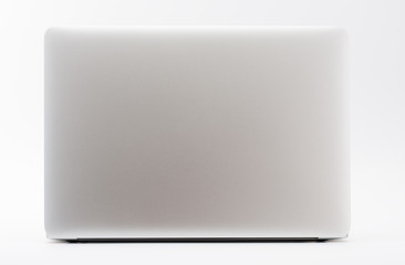 Modern new laptop on white background, back view