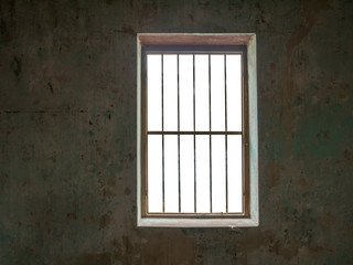 Fototapeta premium Window with bars against old walls,isolated on white background with clipping path for background images.