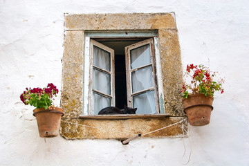 Fototapeta na wymiar Portuguese traditional colorful window. Portugal, Obidos