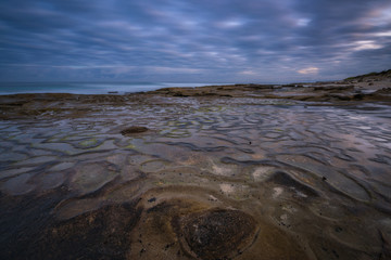 Unique rock formations along the beach in San Diego California 