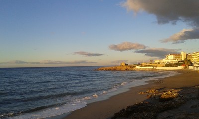 Beach at sunset in Nerja, Spain