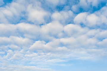 white clouds against blue sky, abstract background