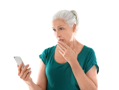 Beautiful Senior Woman With Mobile Phone On White Background