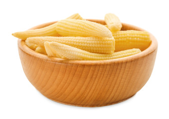 Wooden bowl with fresh young baby corn on white background