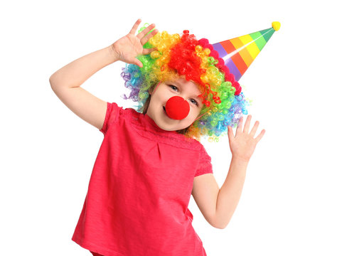 Cute little girl in funny disguise on white background. April fool's day celebration