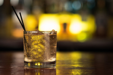 gold rum or whiskey on bar table