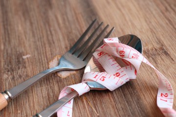 Fork and spoon on wooden