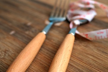 Fork and spoon on wooden