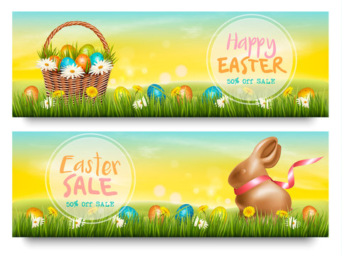 Two Easter Sale banners. Colorful eggs and chocolate bunny on green grass. Vector.