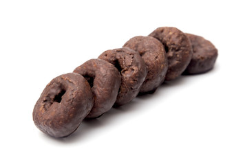 Chocolate Covered Snack Donuts on a White Background
