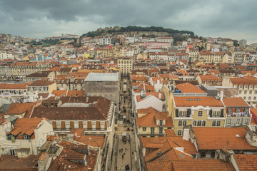 Fototapeta na wymiar LISBON / PORTUGAL - FEBRUARY 17 2018: VIEW ON LISBON CITY FROM ABOVE. ROOFS.