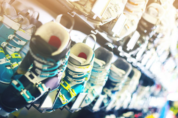 Photography of colorful ski boots on showcase