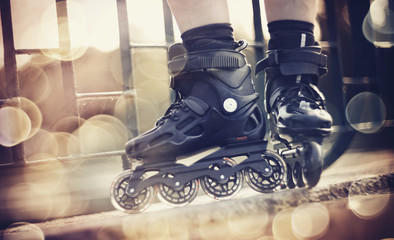 Roller skates in the rays of the sun.