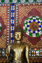 Fototapeta premium Buddha statue at Wat Phra Kaew Don Tao, Lampang, Thailand.