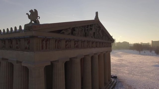 Nashville Snow- Statues on building and sunset wrap around