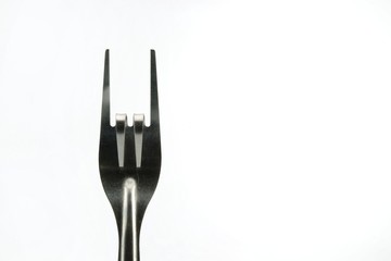 Folding fork as a symbol of love isolated on white background.