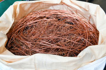 Metal recycling factory. Copper wire pulled out of the discarded cable.
