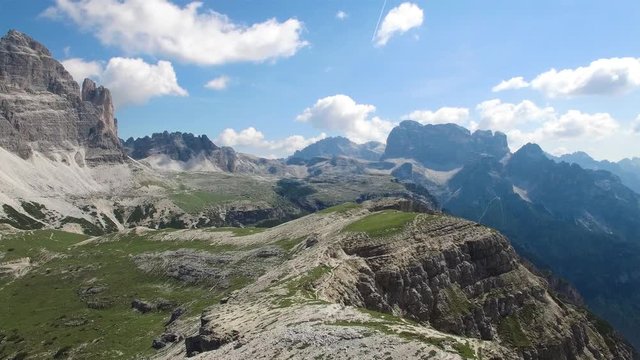 AERIAL VIEW: flight over Dolomiti , Italian National Park Tre Cime Di Lavaredo camera moving forvards .