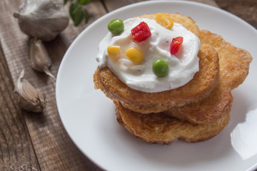 delicious breakfast of toasted round hot crispy toasts on a rural close on the table