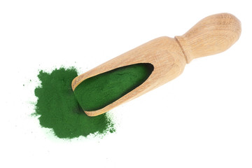 Spirulina algae powder in wooden scoop isolated on white background. Top view