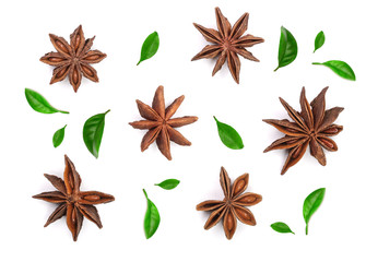 Star anise decorated with leaves isolated on white background. Top view