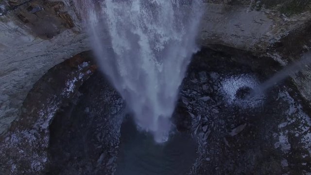 4k Aerial Snow Tennessee Waterfall 004 Close High Tilt Up