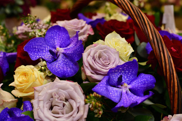 bouquet of flowers in wicker basket