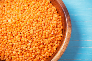 lentils on blue wooden background