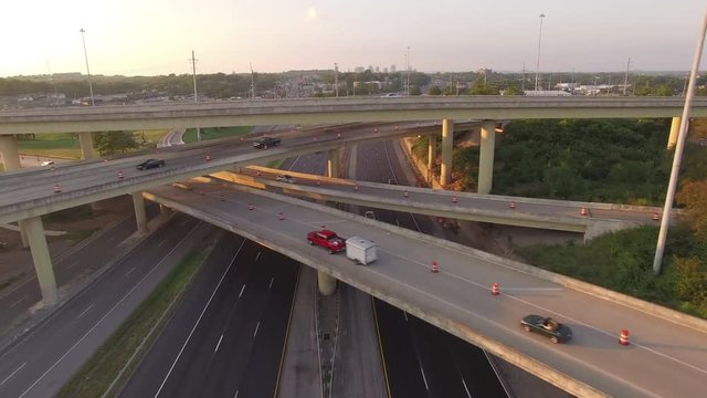 Over Interstate Mixmaster Towards City Skyline at Sunset