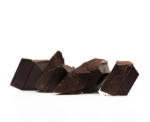 Pieces chocolate on a white background copy space