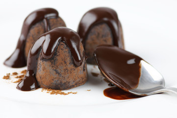 Chocolate truffles with chocolate sauce