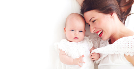 portrait of happy young mother with infant baby girl, daughter