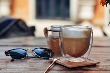 Coffee cup hot on wooden table in the morning 