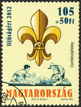 HUNGARY - 2012: shows scout symbol, centenary of the foundation of the Hungarian Scout Association