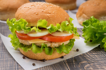 hamburger on old wooden boards, rustic style