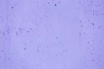 Concrete painted ultra violet color. Background.