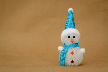 Cute snowman with shawl and cap