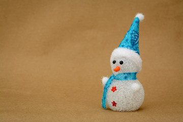 Cute snowman with shawl and cap