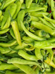 culinary background of fresh hot green chillies