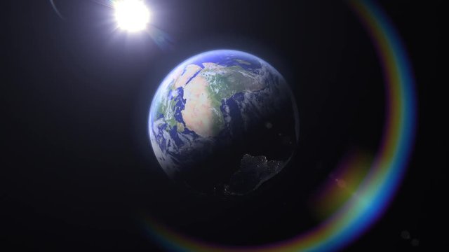 Blue Marble Rainbow, Americas (24fps). Flying towards North America on Earth as it rotates in outer space highlighted with a beautiful rainbow colored flare.