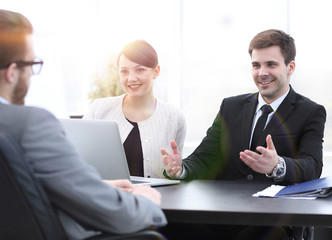 employees communicate with the customer in the office