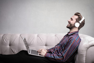 Relaxed man listening to music