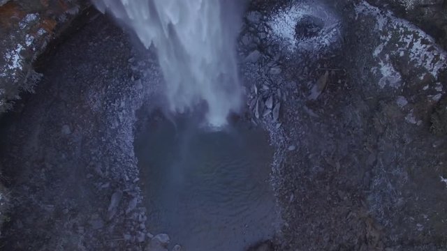4k Aerial Snow Tennessee Waterfall Bird's Eye View 007 Orbit Tilt Up