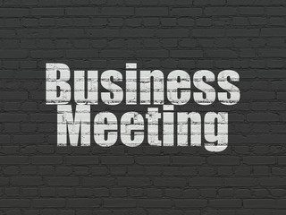 Finance concept: Painted white text Business Meeting on Black Brick wall background