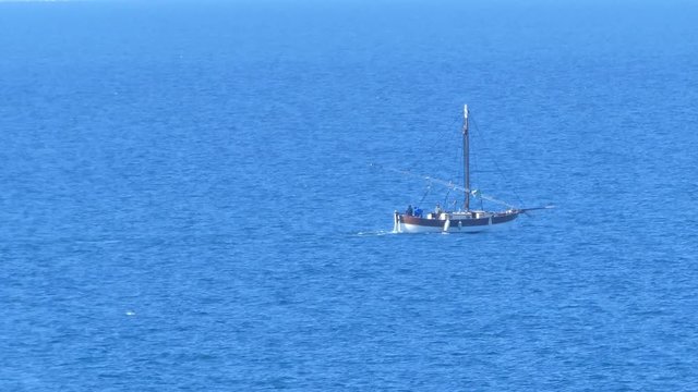 Old fishing boat in the sea