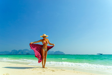 Woman at the beach in Koh Poda island Thailand