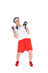 Fototapeta na wymiar Thin man in headband exercising with dumbbells isolated on white