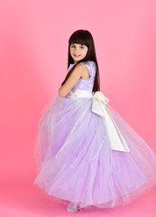 Small girl child model in beautiful dress.